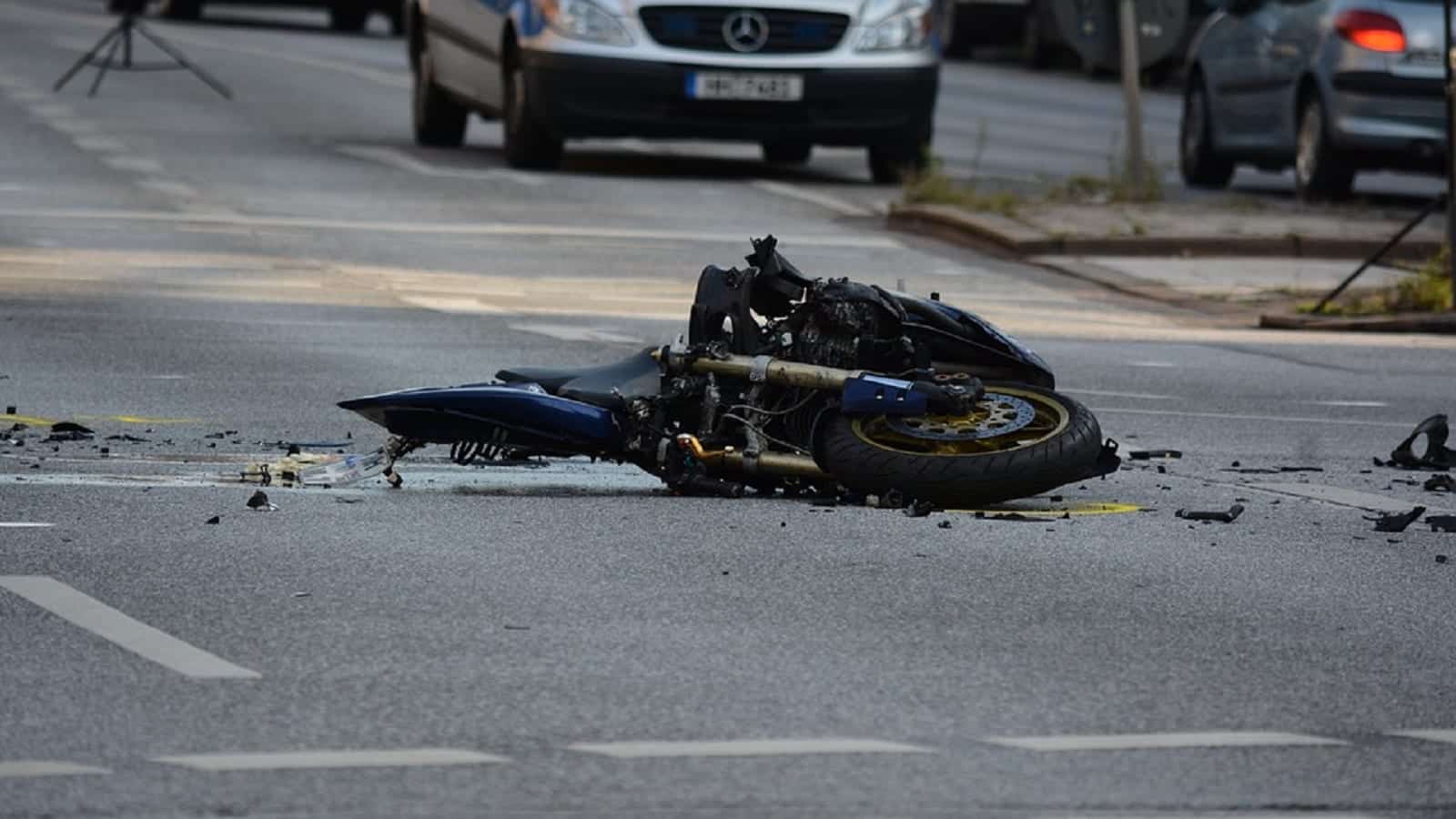 Crashed Motorcycle Laying In The Street