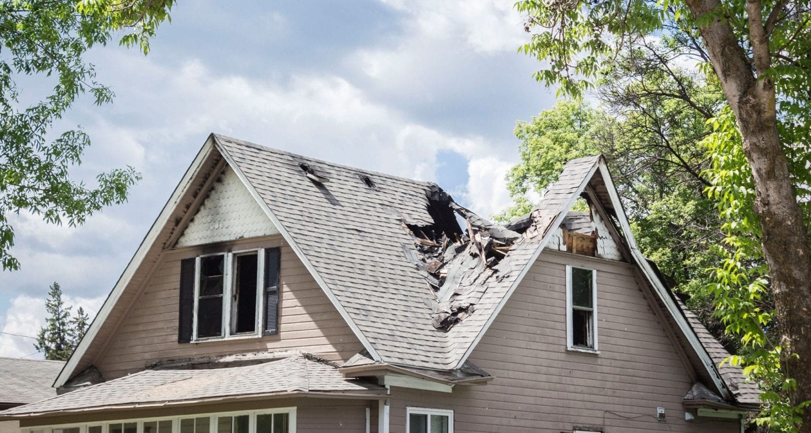 Home With Fire Damage Stock Photo